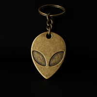 Chaveiro Alien Dourado